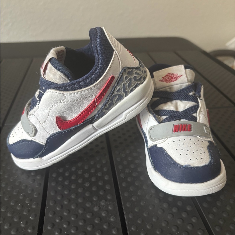 Nike Jordan’s Toddler size 6 White and Navy Sneakers with Red Details